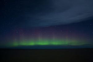 An aurora borealis, also referred to as a polar light or Northern Lights